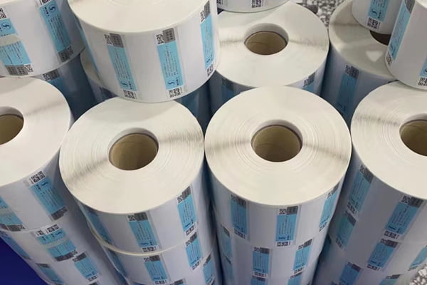 A custom tamper evident label with a company logo and a unique serial number