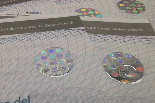 A close-up of a security hologram on a certificate
