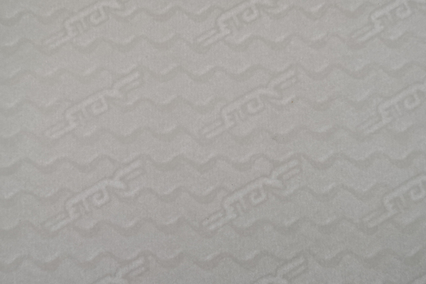 Holding a certificate up to the light to see the watermark